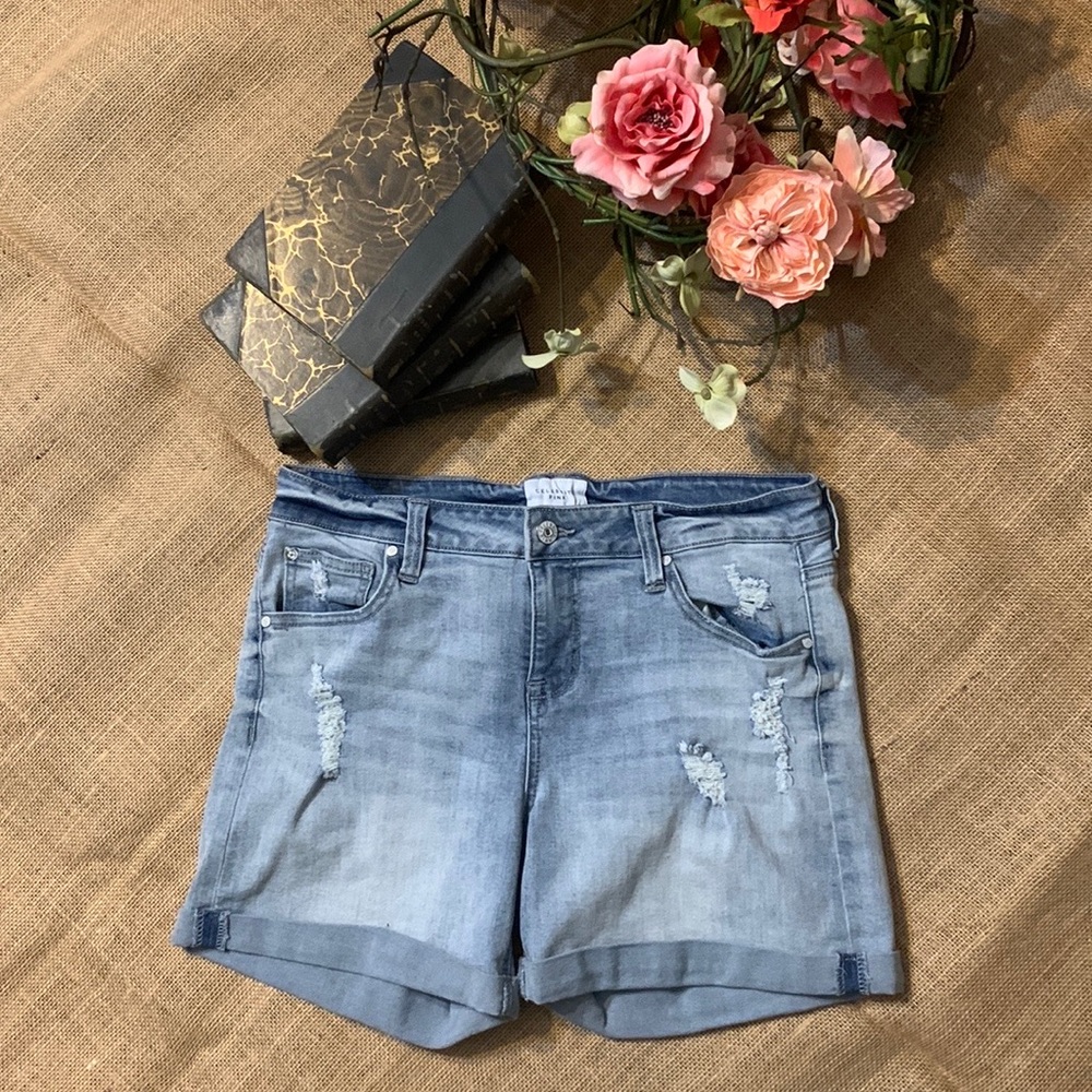 Celebrity pink high-rise light wash distressed mom shorts
